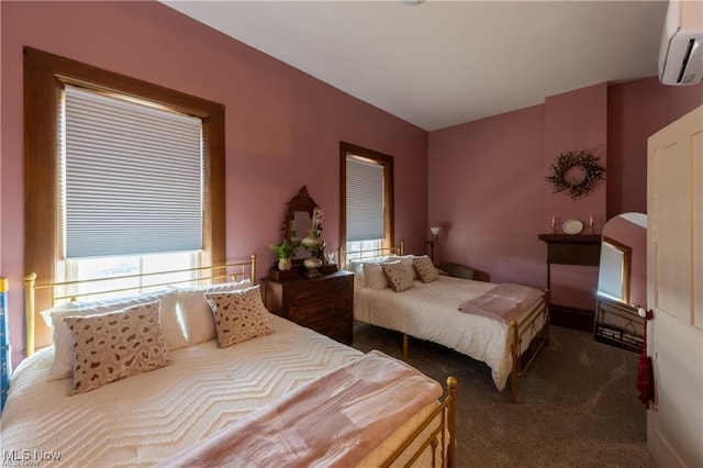 203 W 6th St, Dover, OH 44622 - bedroom featuring a wall unit AC and carpet flooring