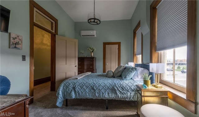203 W 6th St, Dover, OH 44622 - carpeted bedroom featuring an AC wall unit and a chandelier