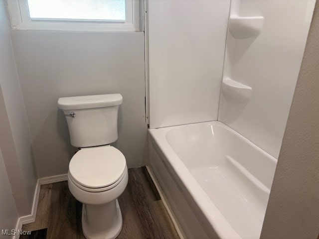 15920 Grove St, Middlefield, OH 44062 - full bath featuring wood finished floors and toilet