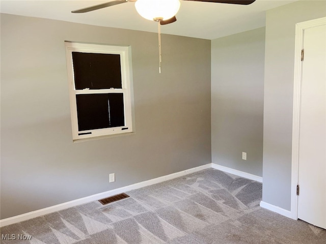 15920 Grove St, Middlefield, OH 44062 - empty room with a ceiling fan and carpet