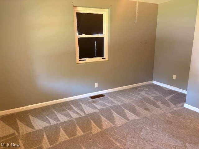 15920 Grove St, Middlefield, OH 44062 - carpeted spare room with baseboards