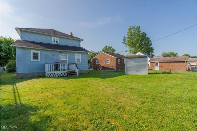 337 Garfield Ave NW, Carrollton, OH 44615 - back of property featuring a shed and a wooden deck