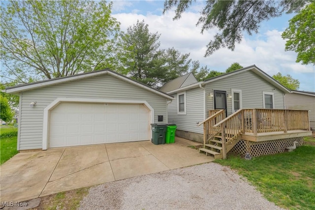 104 24th St NW, Massillon, OH 44647 - view of front facade featuring a detached garage