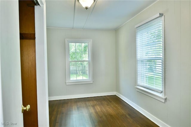 400 Spring St, Struthers, OH 44471 - unfurnished room featuring dark wood-style flooring and crown molding