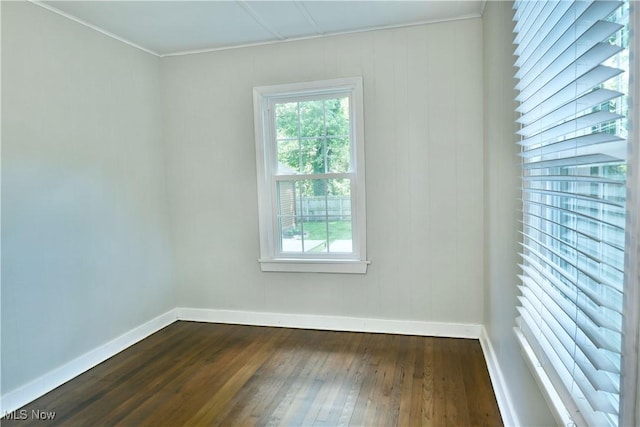 400 Spring St, Struthers, OH 44471 - unfurnished room featuring dark wood-type flooring and crown molding