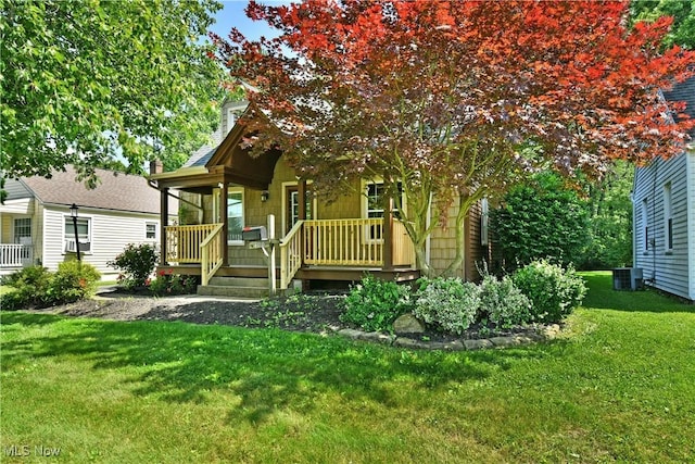 400 Spring St, Struthers, OH 44471 - view of front of home with a front yard and covered porch
