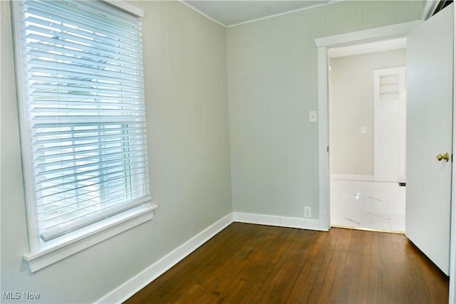 400 Spring St, Struthers, OH 44471 - unfurnished room with dark wood-style flooring and crown molding