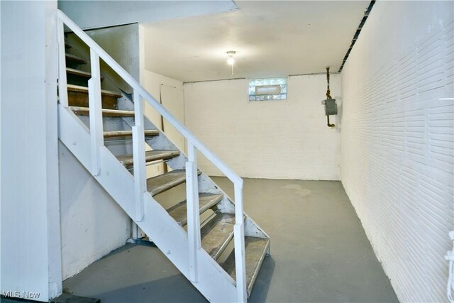 400 Spring St, Struthers, OH 44471 - stairs with finished concrete floors