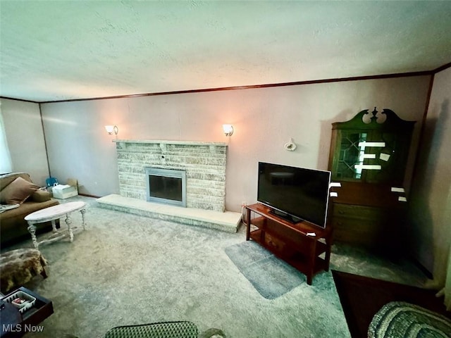 7621 Sandpiper Ave NW, North Canton, OH 44720 - living area with carpet flooring, a textured ceiling, crown molding, and a stone fireplace