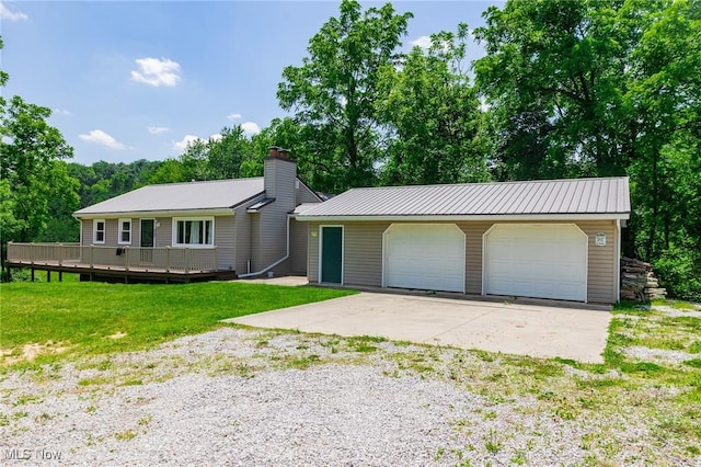 5251 Sugar Grove Rd, Cambridge, OH 43725 - view of front of home featuring a metal roof, a detached garage, a front yard, and a wooden deck