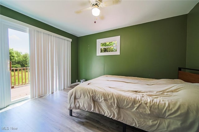 5251 Sugar Grove Rd, Cambridge, OH 43725 - bedroom with access to outside, wood finished floors, and ceiling fan