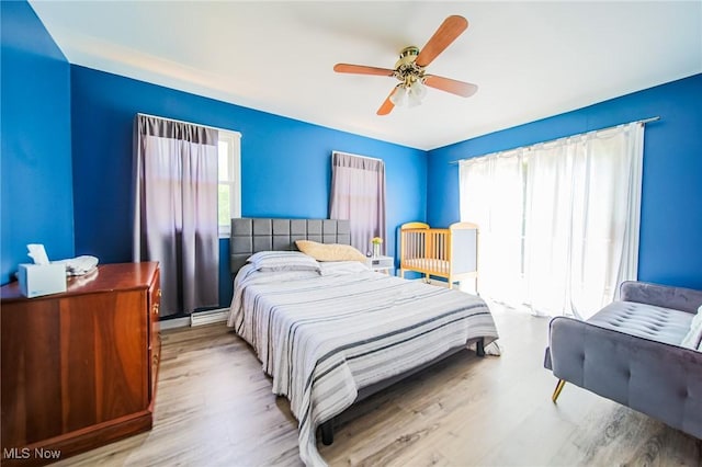 5251 Sugar Grove Rd, Cambridge, OH 43725 - bedroom featuring wood finished floors and a ceiling fan