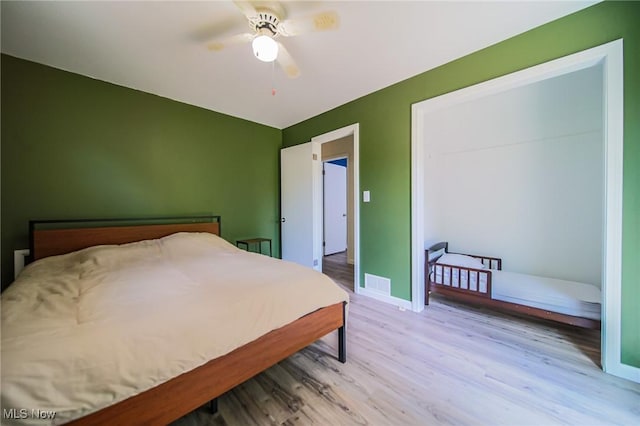 5251 Sugar Grove Rd, Cambridge, OH 43725 - bedroom with light wood-style flooring and ceiling fan