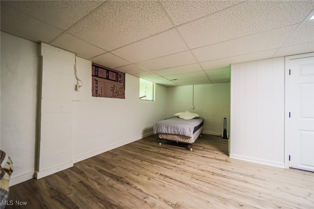 5251 Sugar Grove Rd, Cambridge, OH 43725 - bedroom featuring a drop ceiling and wood finished floors