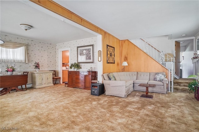 715 E Lincoln Way, Lisbon, OH 44432 - living area featuring carpet, stairs, wallpapered walls, and baseboard heating
