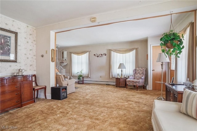 715 E Lincoln Way, Lisbon, OH 44432 - living area featuring a baseboard heating unit, ornamental molding, light colored carpet, and wallpapered walls