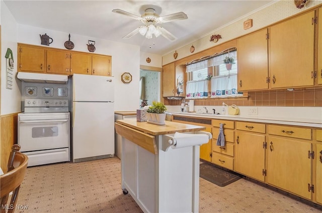 715 E Lincoln Way, Lisbon, OH 44432 - kitchen with white appliances, under cabinet range hood, light countertops, a ceiling fan, and light floors