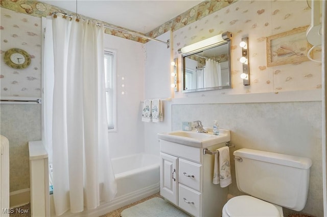 715 E Lincoln Way, Lisbon, OH 44432 - bathroom featuring wallpapered walls, vanity, and shower / tub combo with curtain
