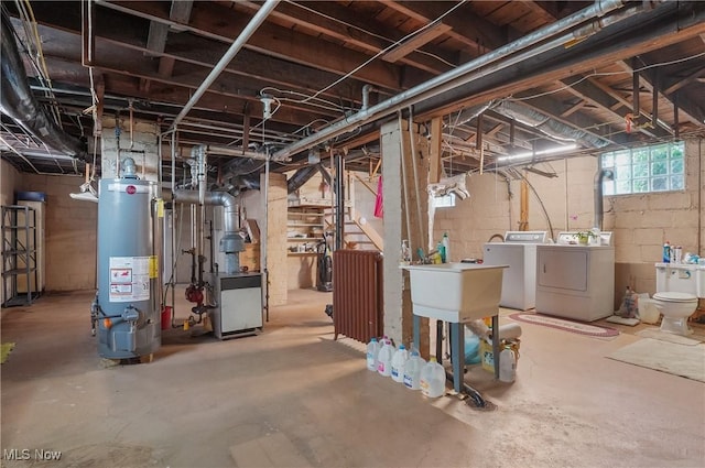 715 E Lincoln Way, Lisbon, OH 44432 - basement featuring gas water heater and washer and dryer