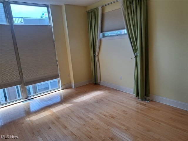 12595 Larchmere Blvd Unit E6, Cleveland, OH 44120 - spare room with plenty of natural light and light wood finished floors