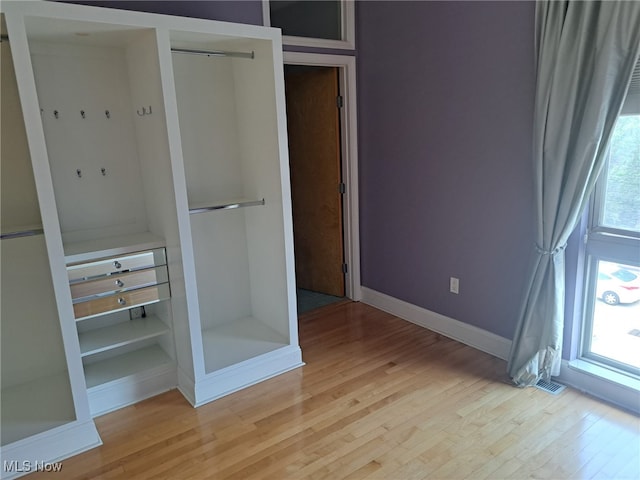 12595 Larchmere Blvd Unit E6, Cleveland, OH 44120 - bathroom featuring wood finished floors and walk in shower