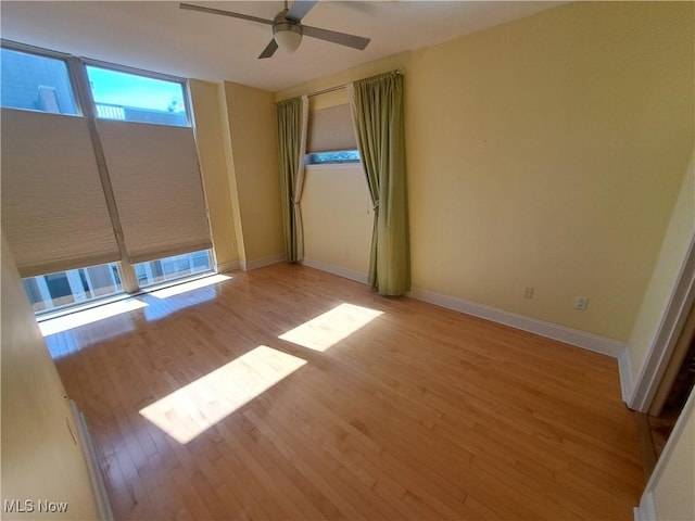 12595 Larchmere Blvd Unit E6, Cleveland, OH 44120 - spare room with light wood finished floors and ceiling fan