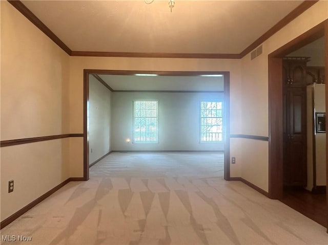 132 Beechwood Dr, Cortland, OH 44410 - unfurnished room featuring crown molding and light colored carpet