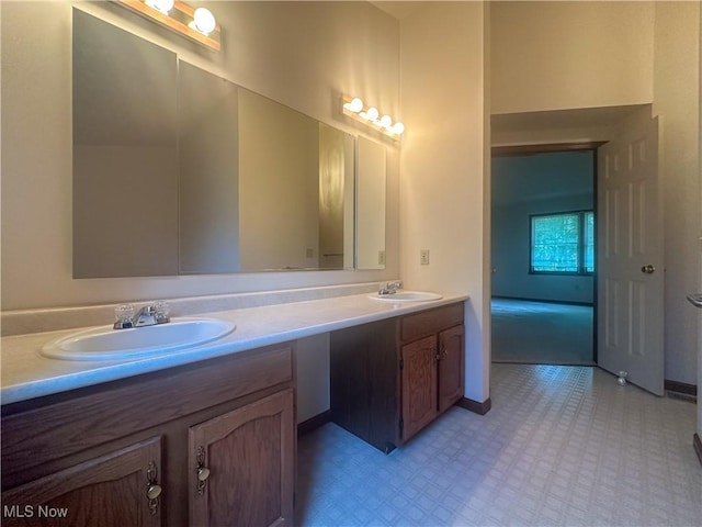 132 Beechwood Dr, Cortland, OH 44410 - full bath featuring double vanity and tile patterned floors