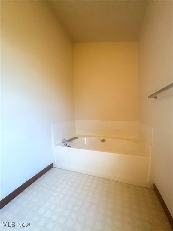 132 Beechwood Dr, Cortland, OH 44410 - full bath with a bath and tile patterned floors