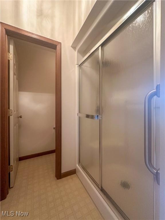 132 Beechwood Dr, Cortland, OH 44410 - full bath with tile patterned floors and an enclosed shower