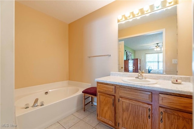 6706 Hogan Way NW, Canton, OH 44718 - bathroom featuring vanity, tile patterned floors, and a garden tub