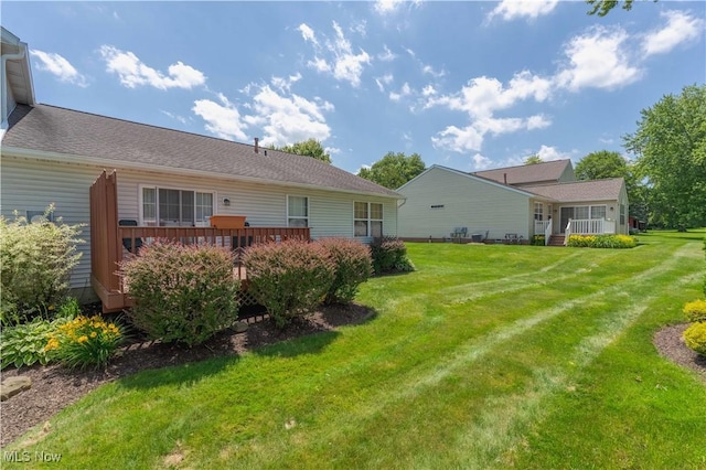 6706 Hogan Way NW, Canton, OH 44718 - view of grassy yard with a deck
