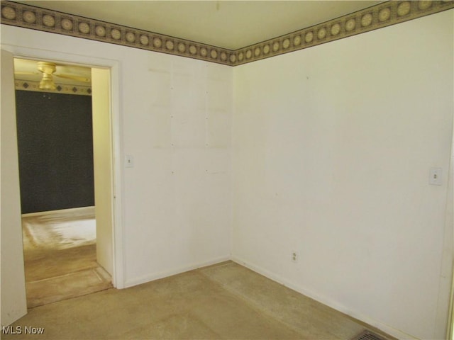 12316 Sunset Dr, Garfield Heights, OH 44125 - unfurnished room featuring light colored carpet and baseboards