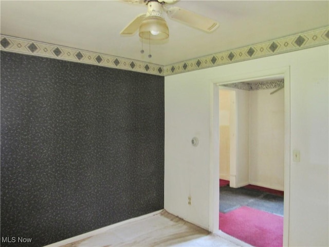 12316 Sunset Dr, Garfield Heights, OH 44125 - carpeted empty room featuring ceiling fan