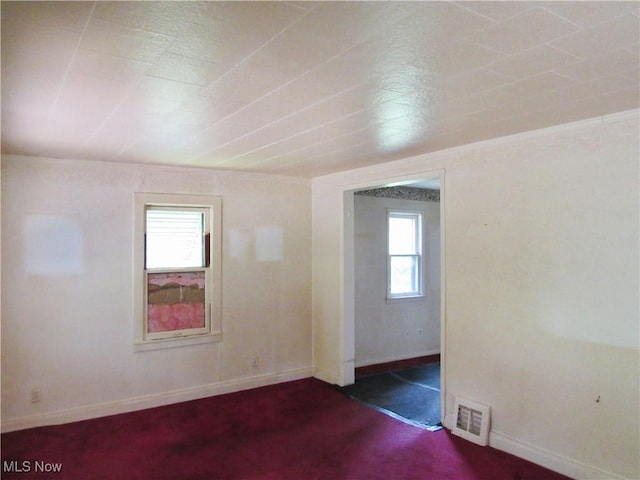 12316 Sunset Dr, Garfield Heights, OH 44125 - unfurnished room with baseboards and carpet flooring