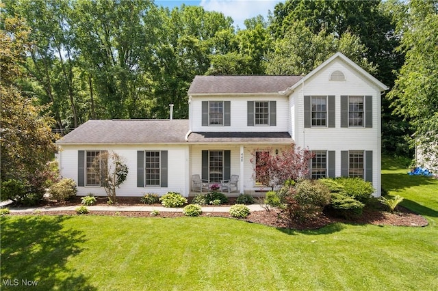 448 Derbyshire Rd, Akron, OH 44319 - view of front of house with a porch and a front yard