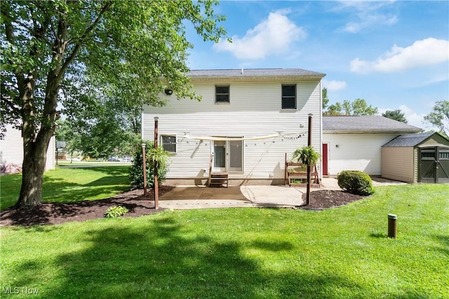 448 Derbyshire Rd, Akron, OH 44319 - back of property featuring a patio, a storage unit, and a lawn
