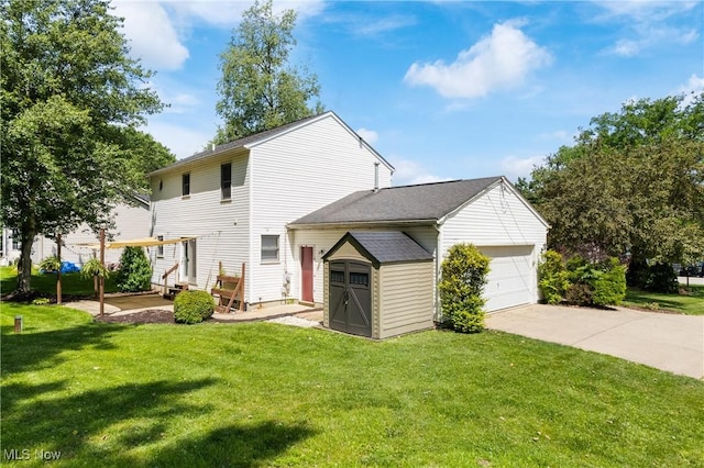 448 Derbyshire Rd, Akron, OH 44319 - view of home's exterior featuring a garage, a lawn, driveway, and roof with shingles