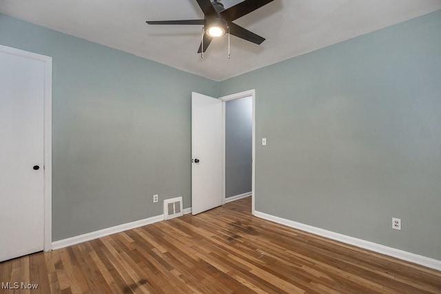 11202 Mountview Ave, Garfield Heights, OH 44125 - unfurnished room with ceiling fan and wood finished floors