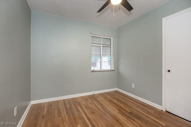 11202 Mountview Ave, Garfield Heights, OH 44125 - empty room featuring a ceiling fan and wood finished floors