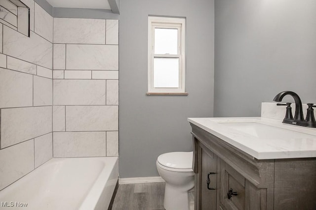 11202 Mountview Ave, Garfield Heights, OH 44125 - full bathroom with vanity, wood finished floors, and shower / bathtub combination