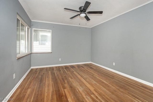 11202 Mountview Ave, Garfield Heights, OH 44125 - empty room featuring wood finished floors and a ceiling fan