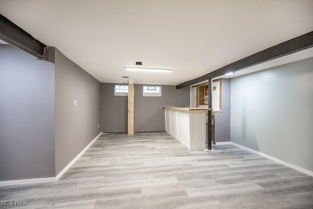 11202 Mountview Ave, Garfield Heights, OH 44125 - basement featuring light wood-style floors and bar