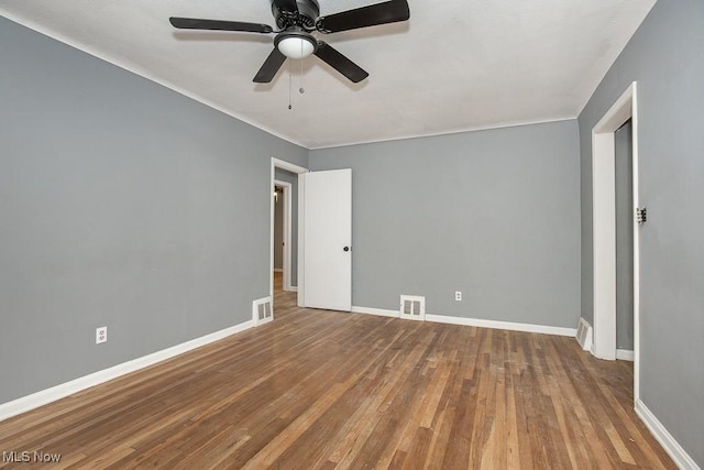 11202 Mountview Ave, Garfield Heights, OH 44125 - spare room with wood finished floors and a ceiling fan