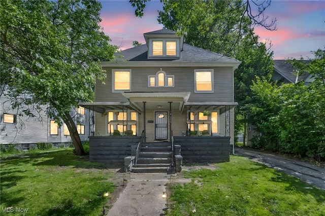 10602 Orville Ave, Cleveland, OH 44106 - traditional style home with a porch and a front yard