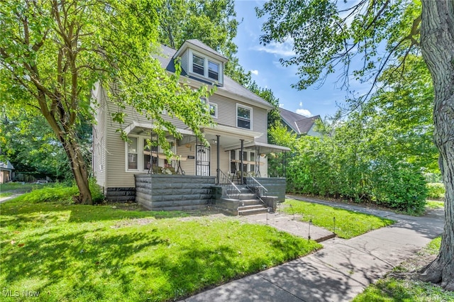 10602 Orville Ave, Cleveland, OH 44106 - traditional style home with covered porch and a front lawn