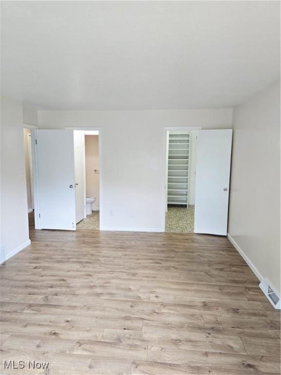 6466 Concord Dr Unit M1, Parma, OH 44134 - empty room with light wood-style flooring