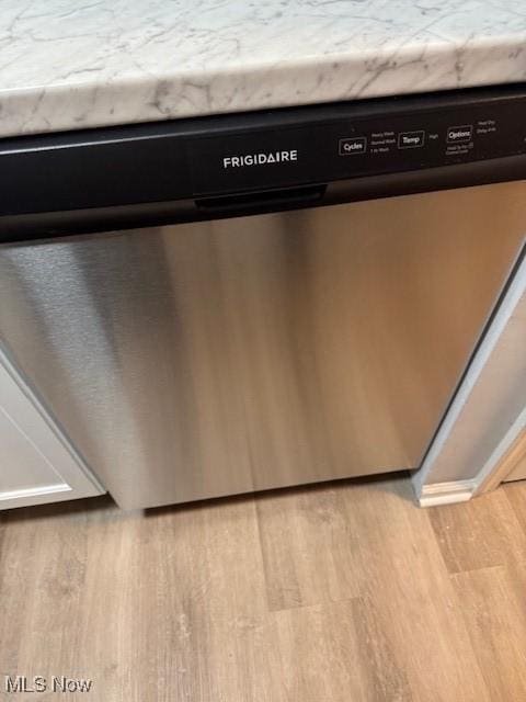 4360 Inner Circle Dr Unit C15, Brunswick, OH 44212 - kitchen view of light wood finished floors and dishwasher