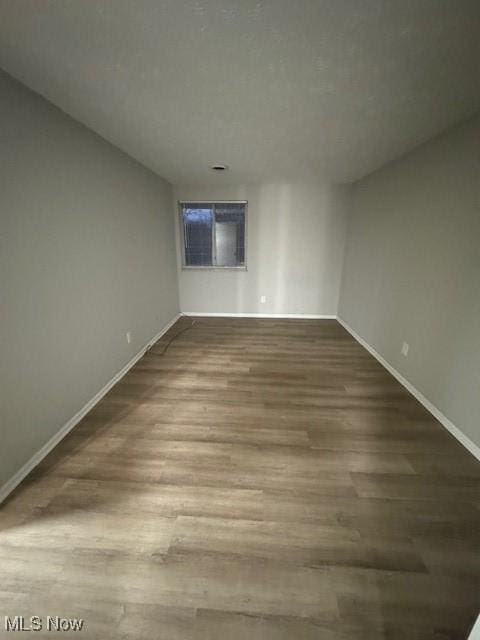4360 Inner Circle Dr Unit C15, Brunswick, OH 44212 - empty room with baseboards and wood finished floors