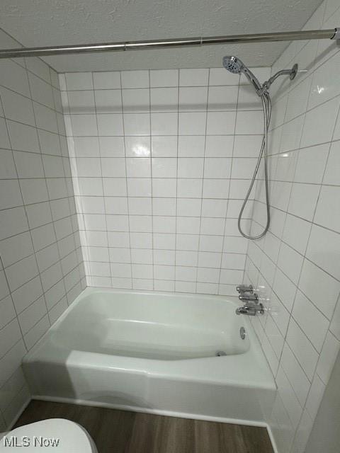 4360 Inner Circle Dr Unit C15, Brunswick, OH 44212 - full bathroom featuring wood finished floors and bathing tub / shower combination